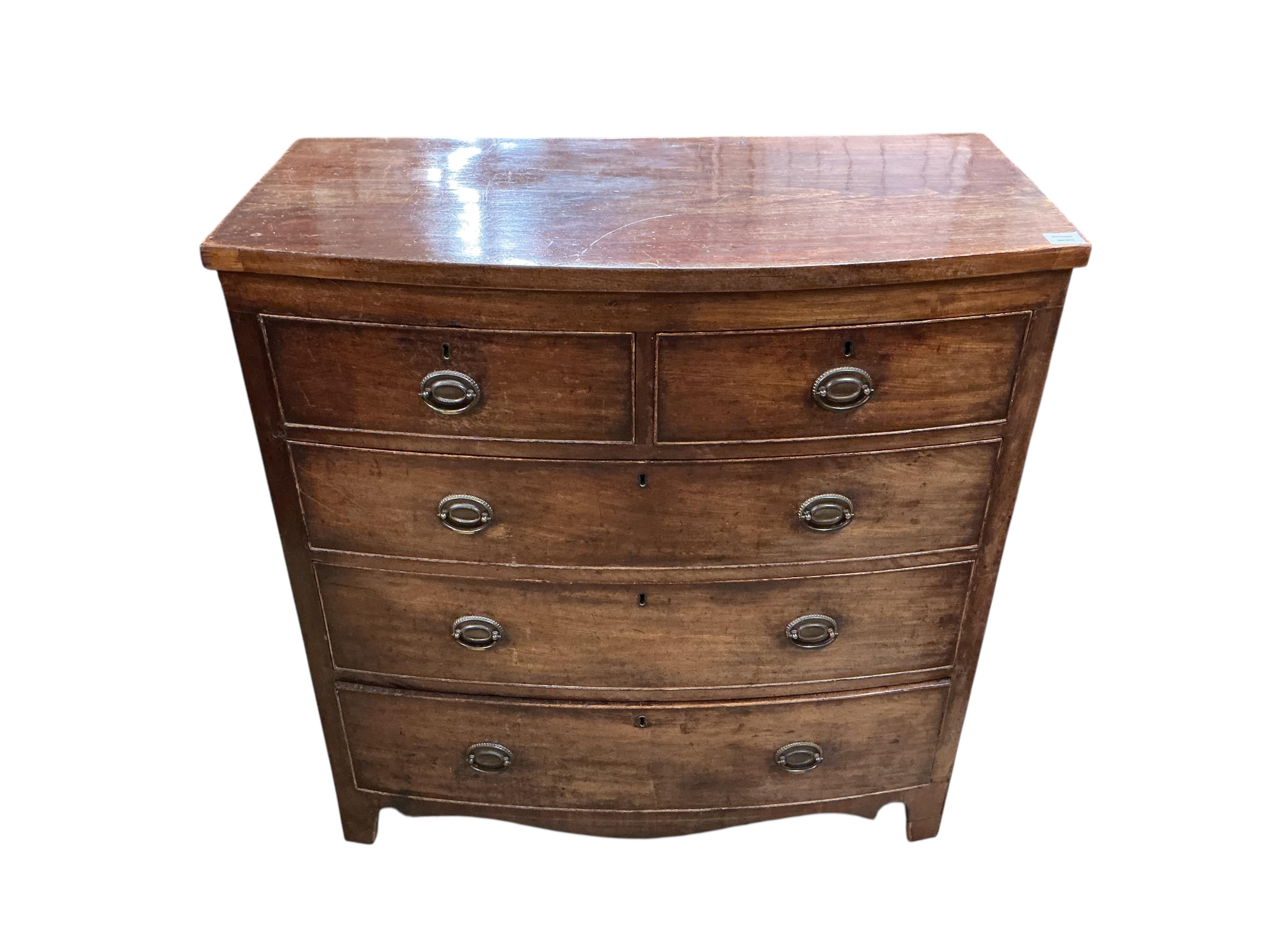 A Regency mahogany bow front chest with two short and three long drawers, width 103cm, depth 51cm, height 107cm